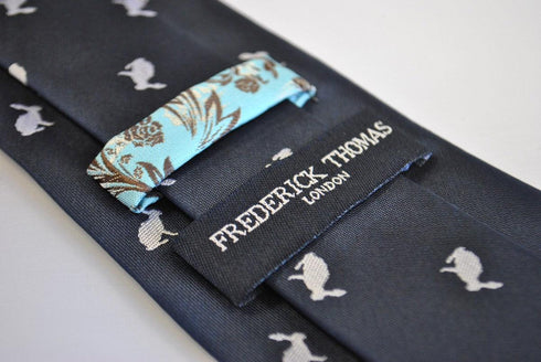 navy tie with white rabbit silhouette design